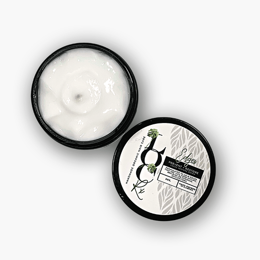 A jar of Edges Loss Prevention Cream with a label that reads "targets hair loss and boosts scalp and hair health with apigenin and oleanolic acid". Clinical studies show an increase in cell regeneration at the root sheath, leading to thicker and healthier hair. Safe for use but discontinue if irritation occurs. Perfect for loc lovers struggling with thin edges.